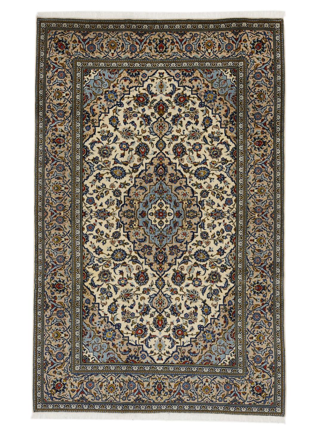 Hand-knotted Keshan rug from the Middle East with a floral medallion in beige and blue.
