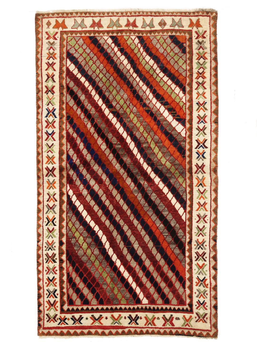 Hand-knotted Ghashghai rug from the Middle East with a multicolored diagonal lattice pattern