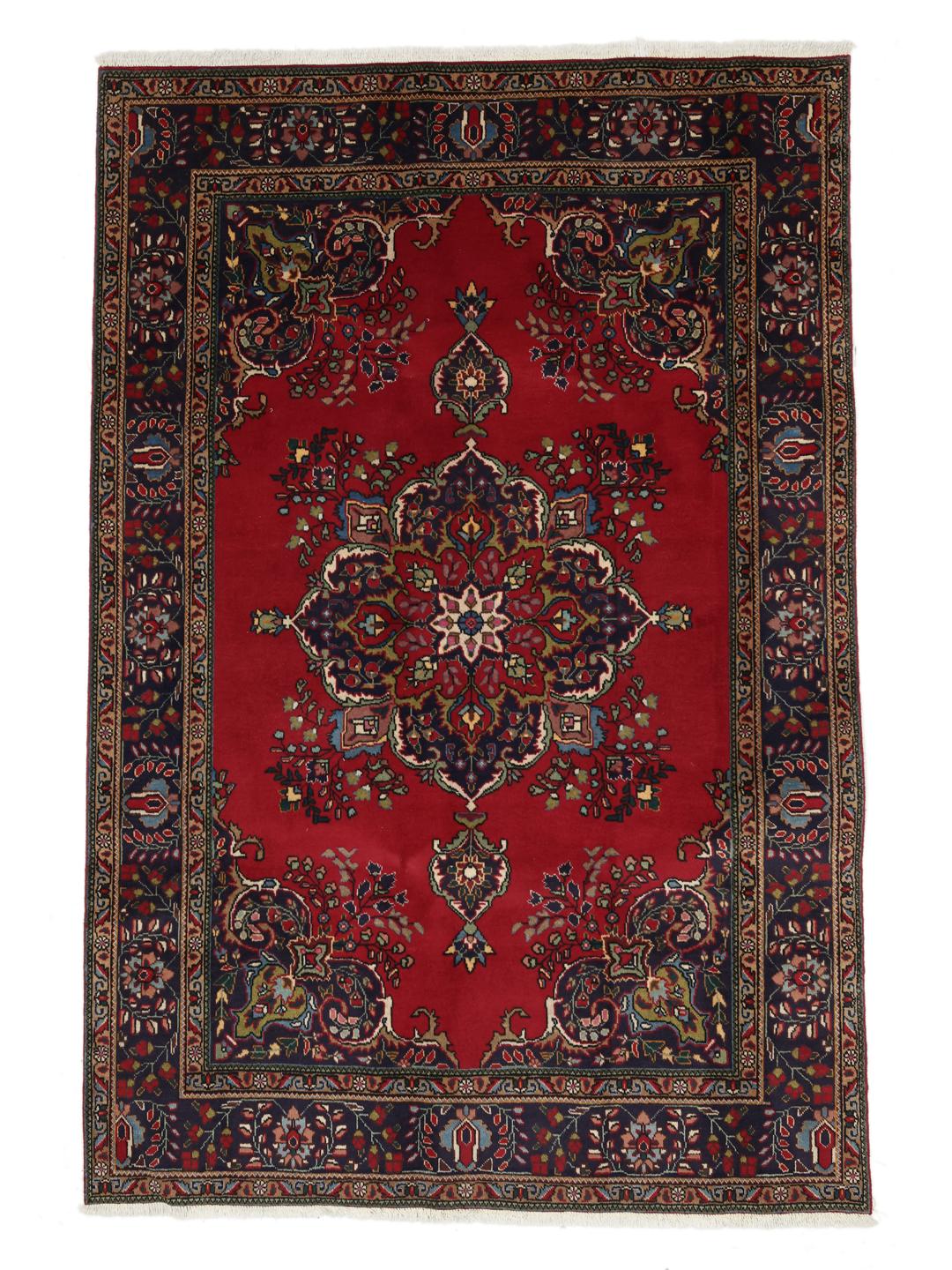 Handmade Tabriz rug from the Middle East in red