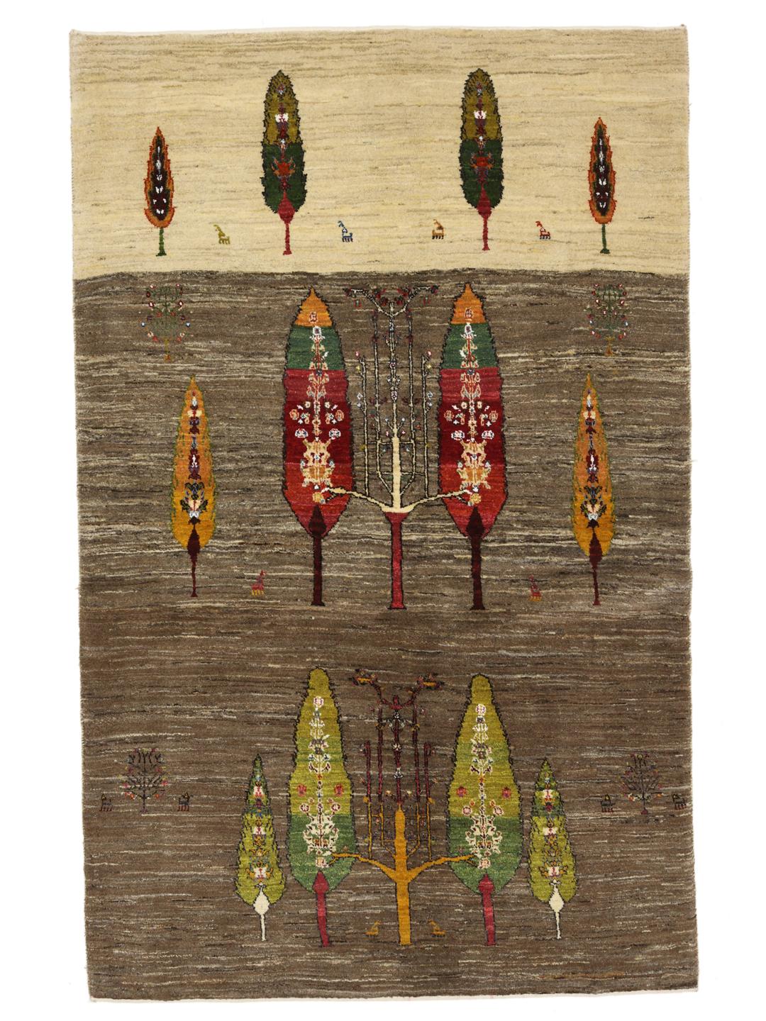 Hand-knotted Gabbeh rug from the Middle East featuring tree motifs in brown and beige colours.