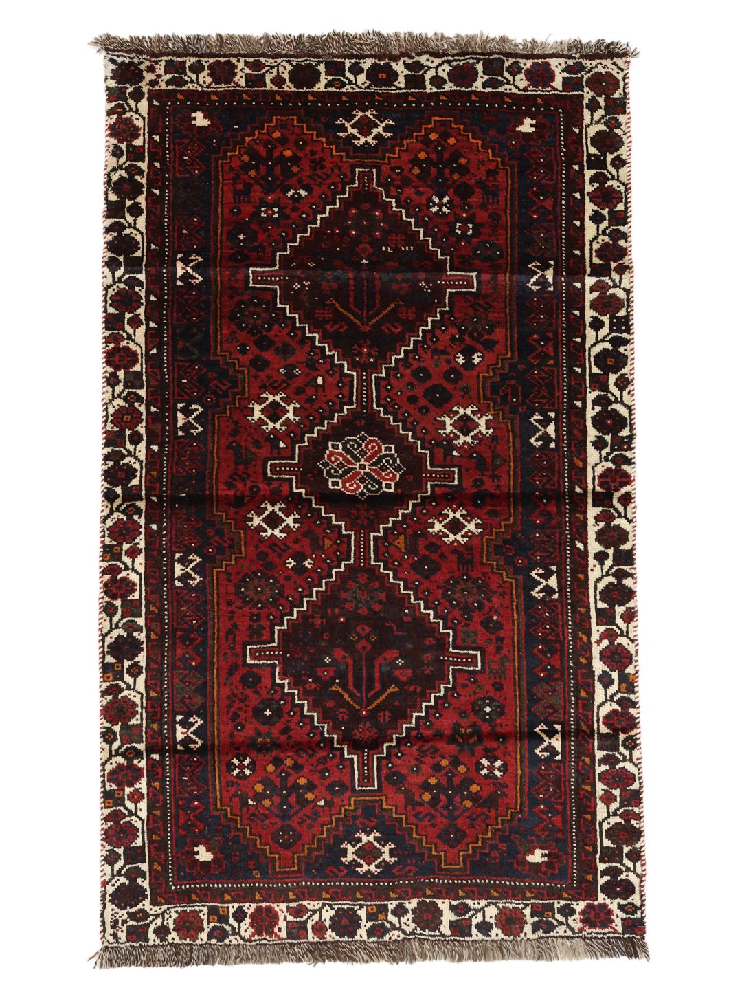 Hand-knotted Shiraz rug in dark red and black with tribal geometric patterns