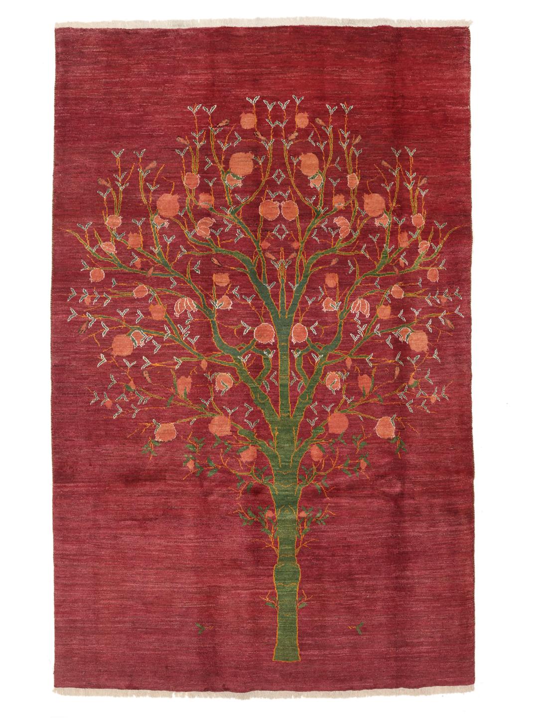 Hand-knotted Gabbeh rug from the Middle East with a red field and a tree of life design