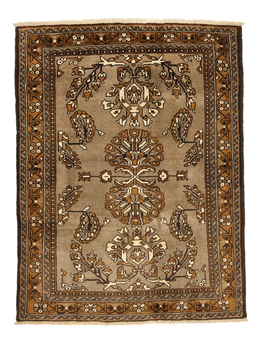 A hand-knotted Shiraz rug from the Middle East featuring brown floral motifs.