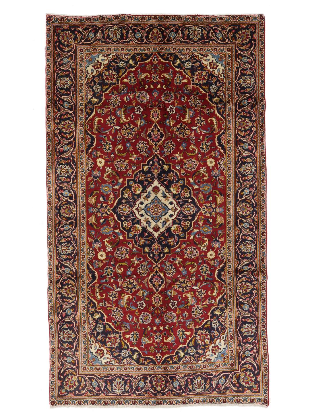 Hand-knotted Keshan rug from the Middle East in red and blue