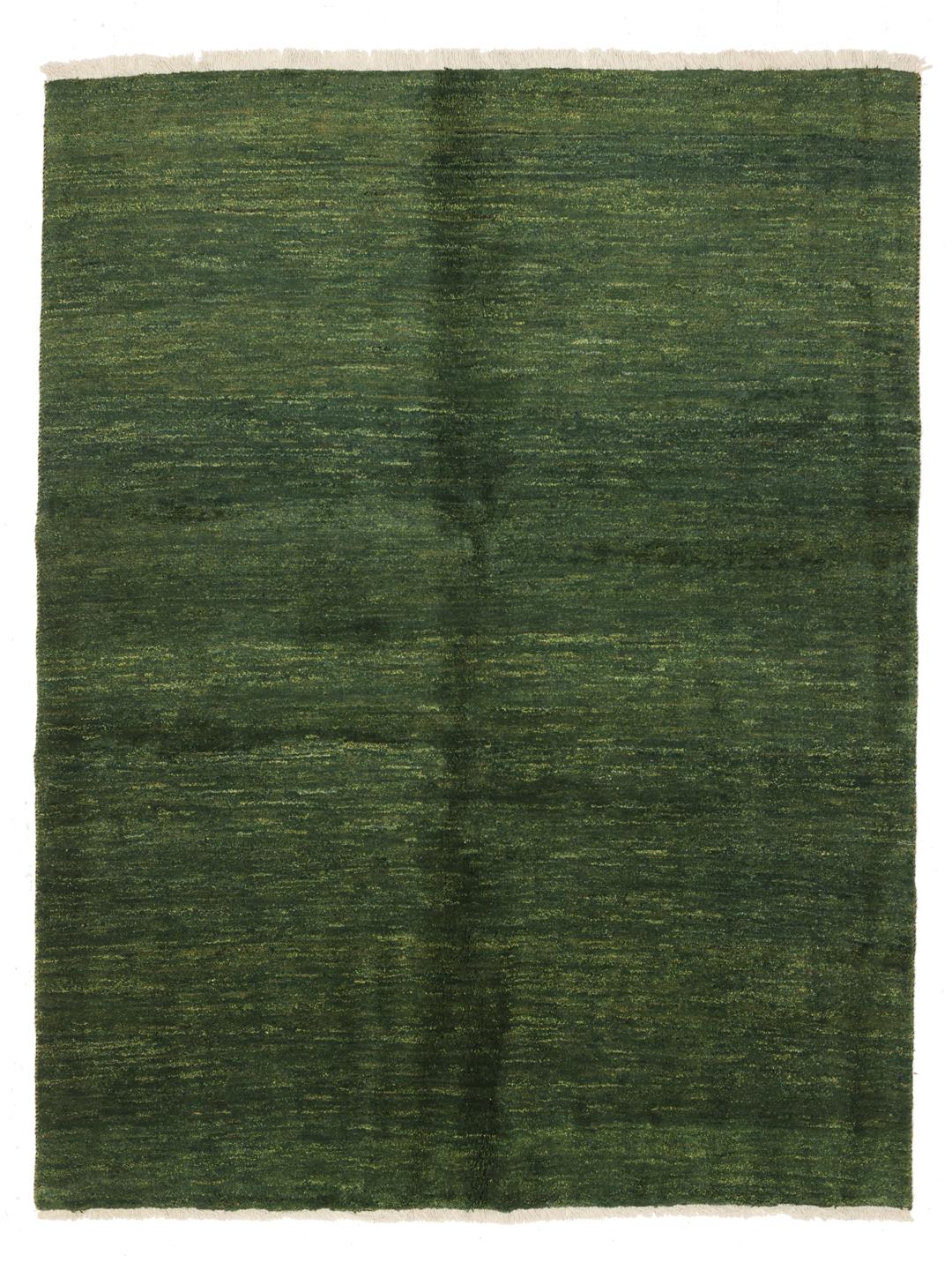 A hand-knotted Gabbeh rug from the Middle East in a deep, variegated dark-green colour.