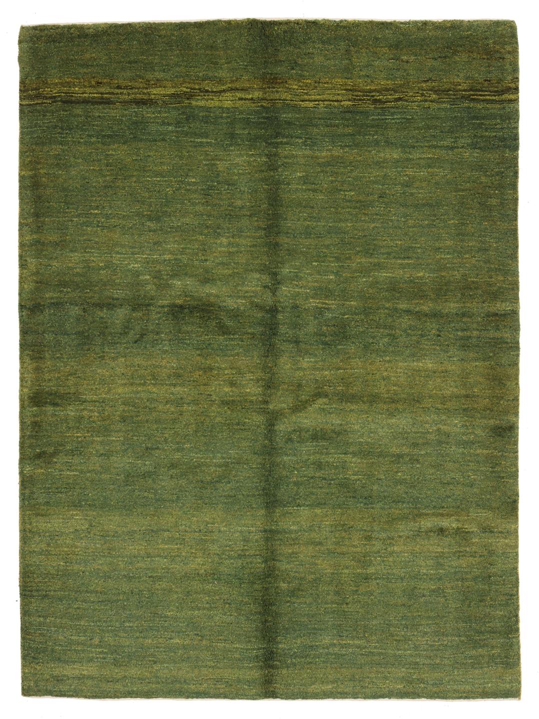 Hand-knotted green wool rug from the Middle East