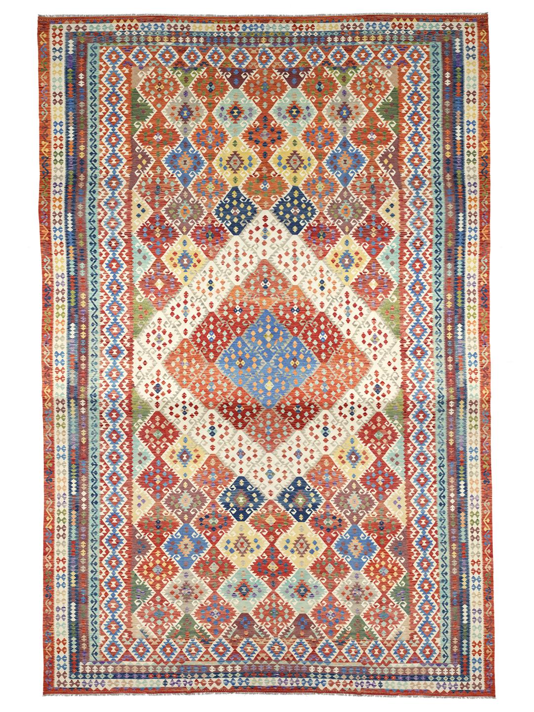 A large, hand-woven Afghan Kelim rug featuring a vibrant geometric pattern in multicolor tones.