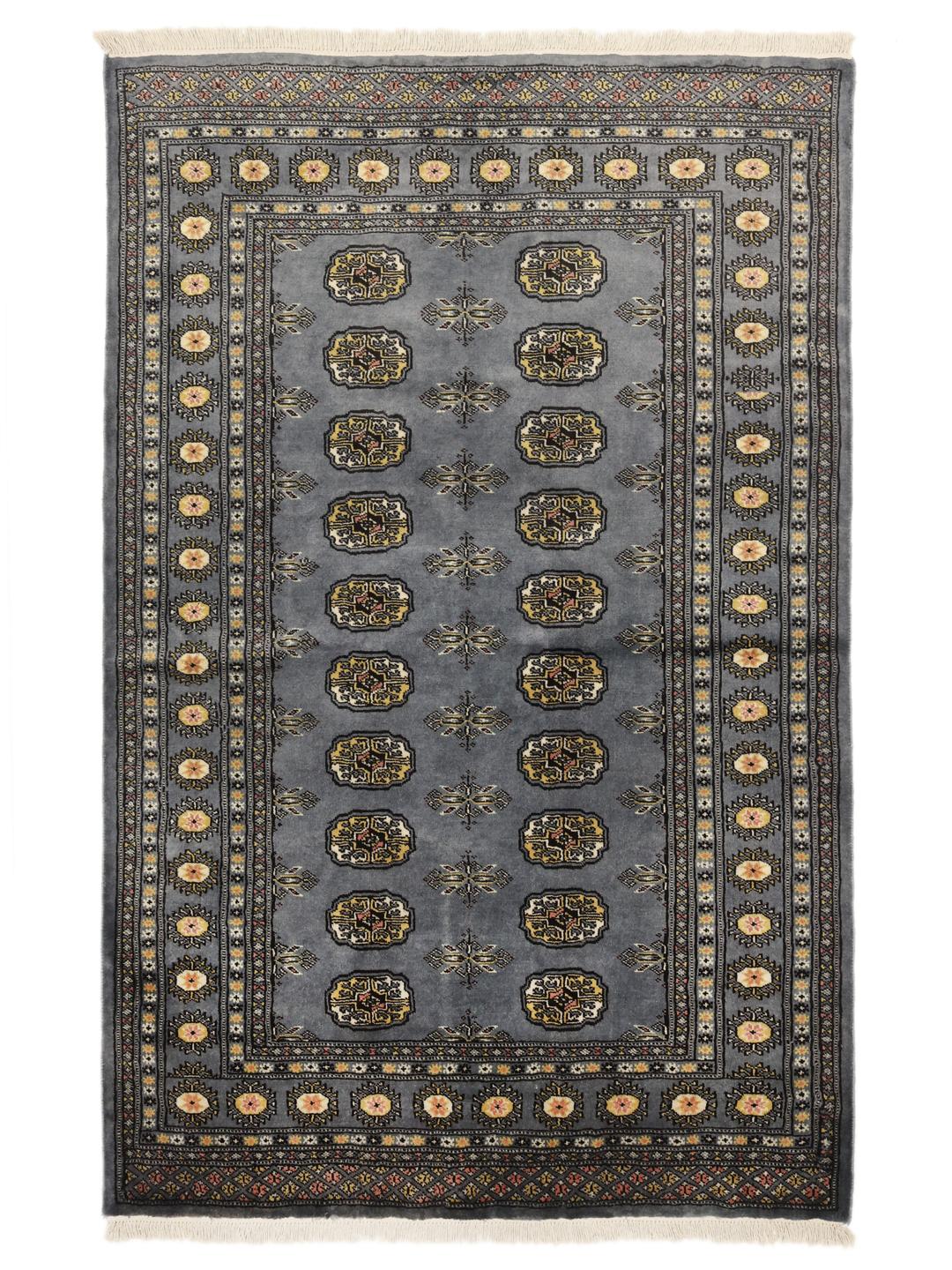 A hand-knotted Pakistan Bokhara rug in grey with traditional medallion motifs.