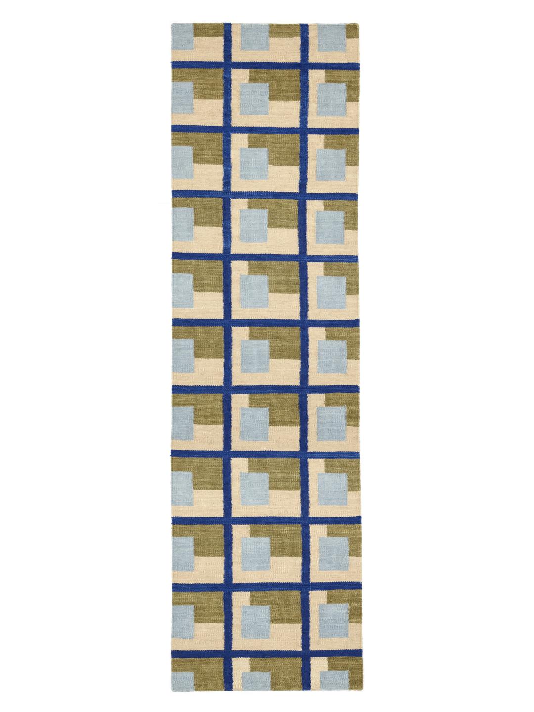 Groene loper met een geometrisch patroon van rasters
