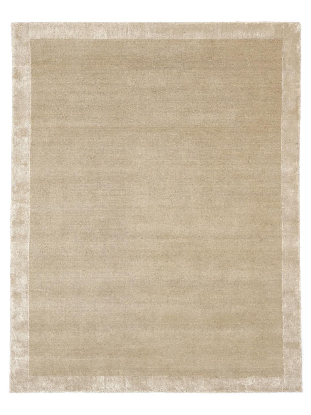 Beige tapijt met een zachte handloom textuur