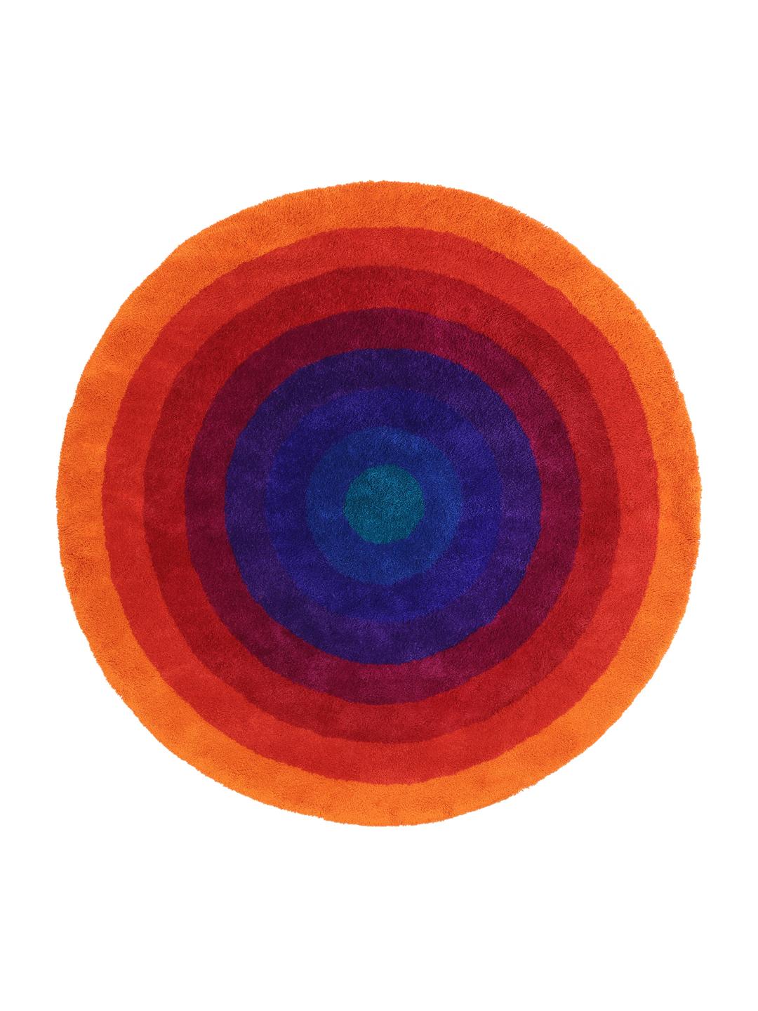 Rond tapijt met concentrische ringen in oranje en meerkleurige tinten