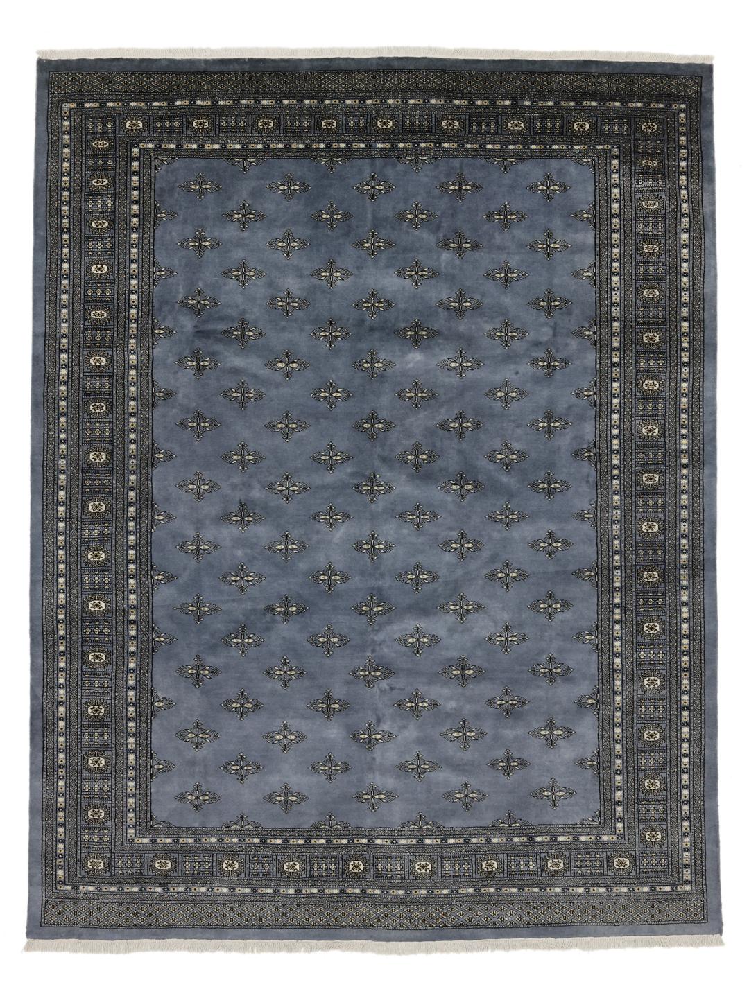 Hand-knotted Pakistani Bokhara rug in deep blue with repeating motifs