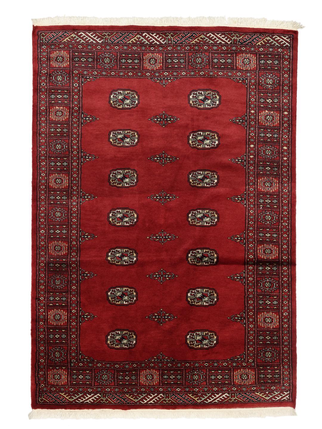 Hand-knotted red Bokhara rug from Pakistan