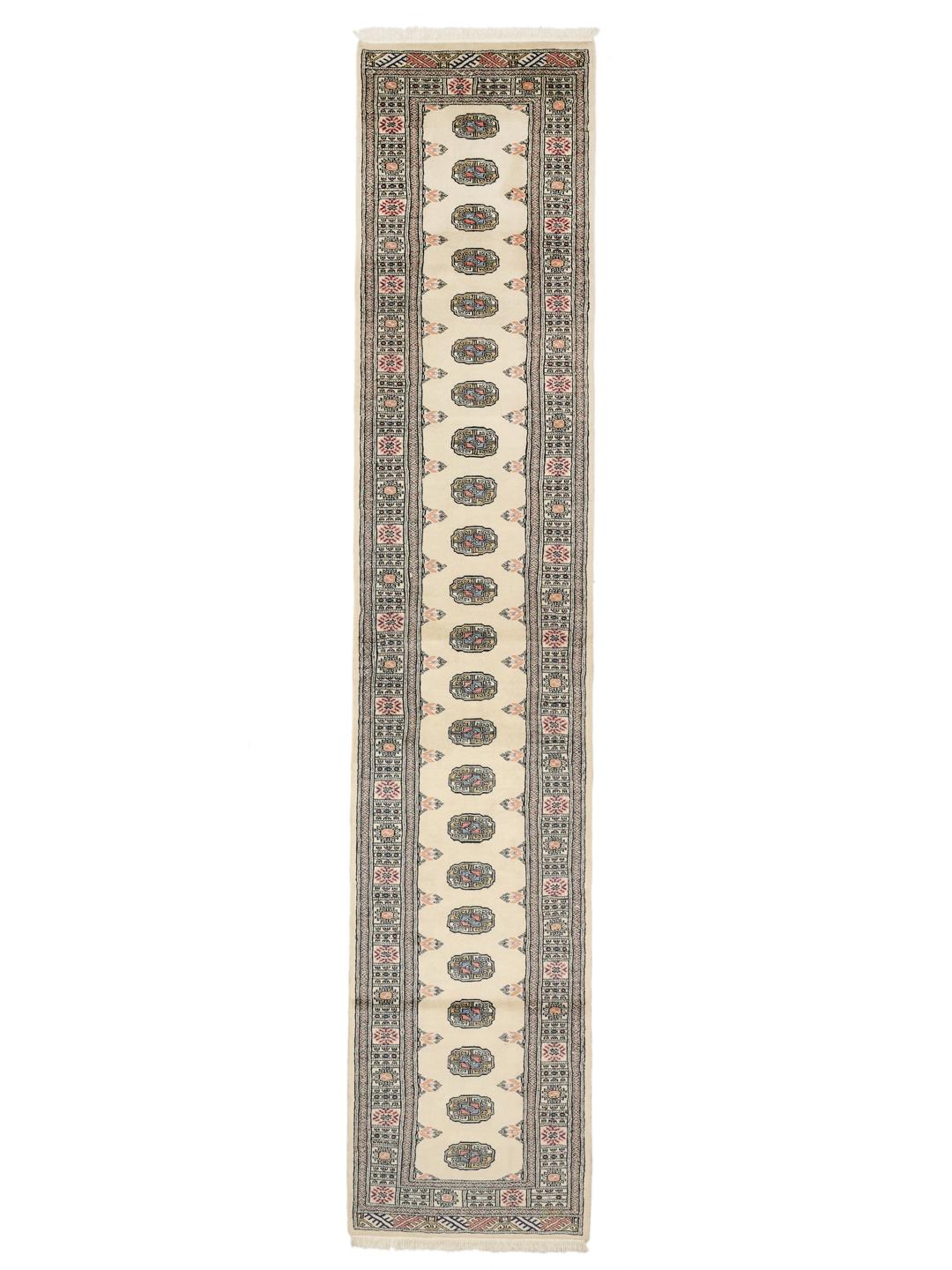 Hand-knotted beige Pakistan runner with a traditional decorative border