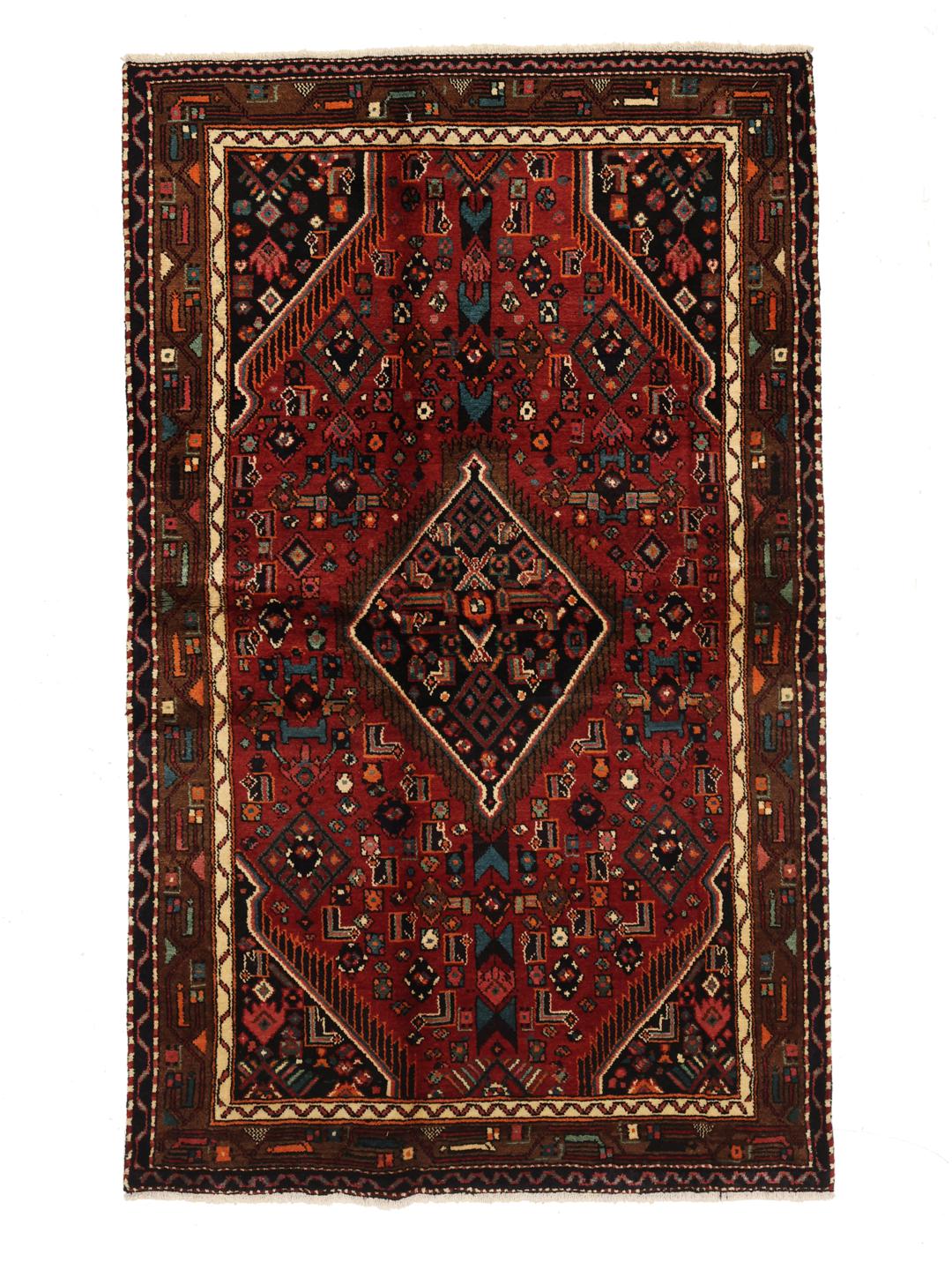 A hand-knotted Hamadan rug from the Middle East featuring a dark-red field with geometric motifs.