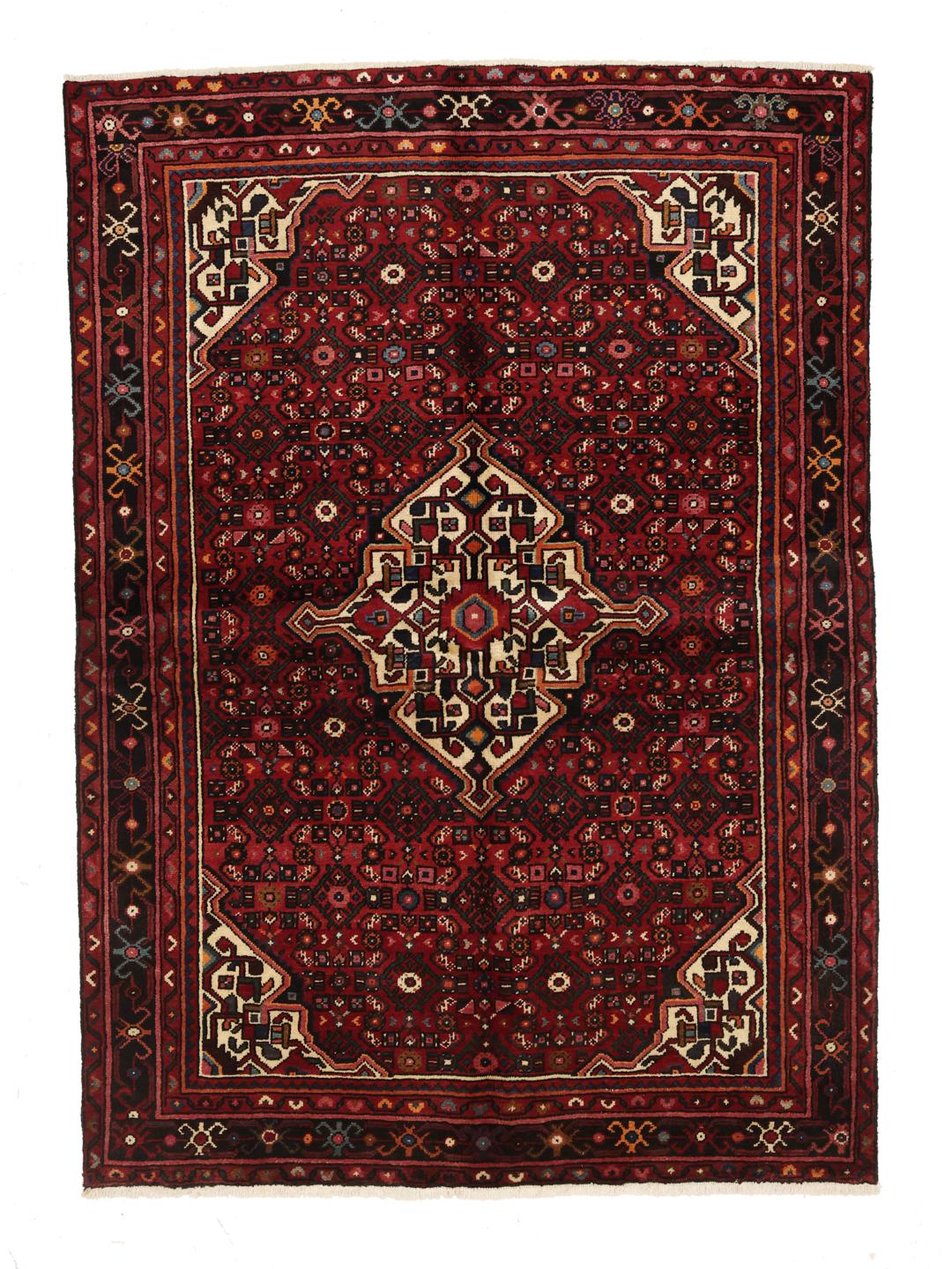 Hand-knotted Hosseinabad rug from the Middle East in dark-red with geometric motifs