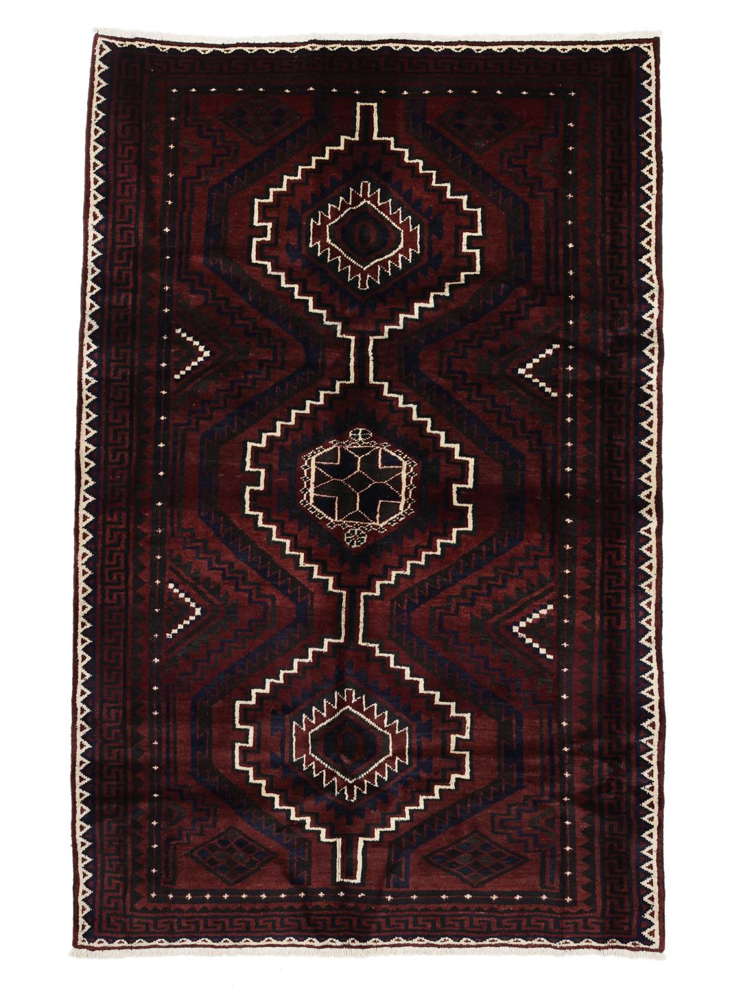 A hand-knotted Lori rug from the Middle East in dark-red with geometric patterns