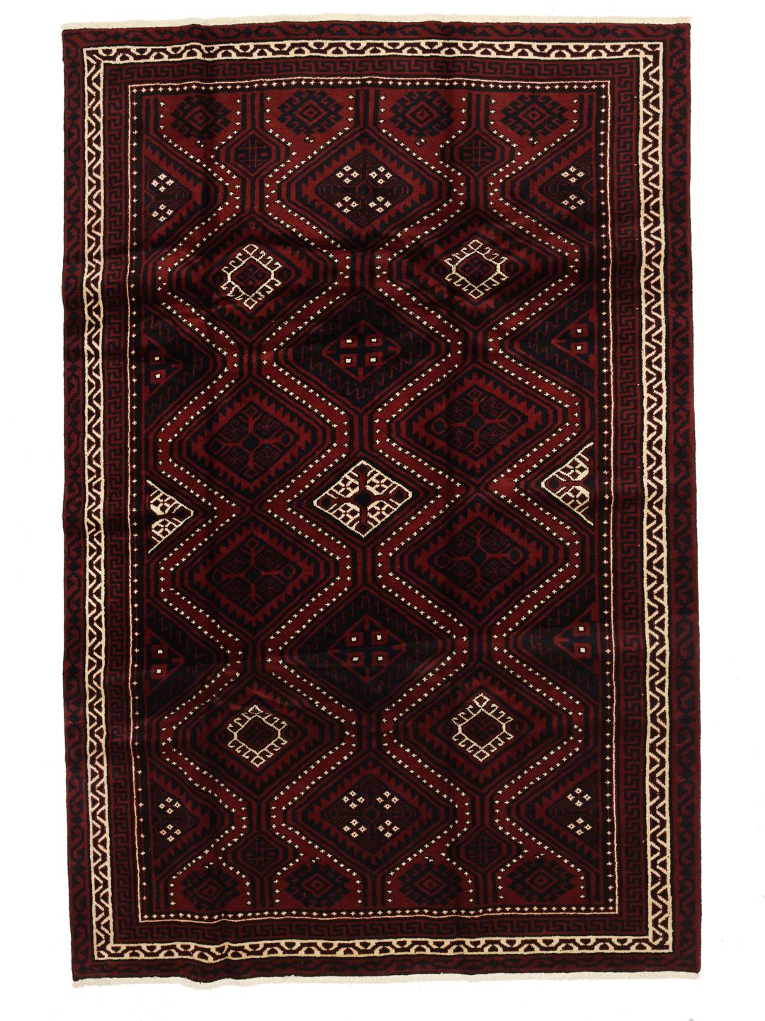 A hand-knotted Lori rug from the Middle East in dark-red with geometric patterns.