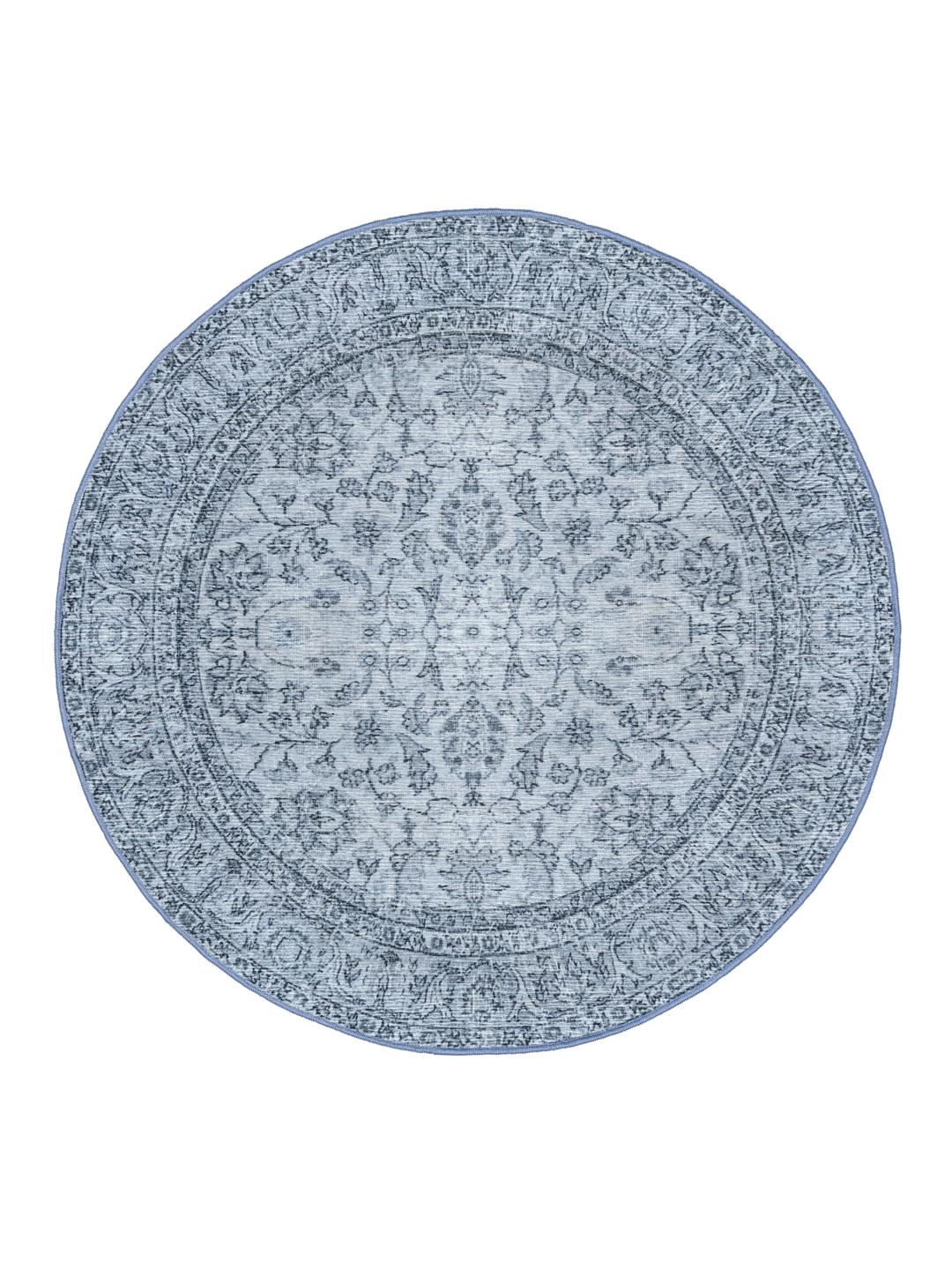 Rond blauw tapijt met medaillonpatroon