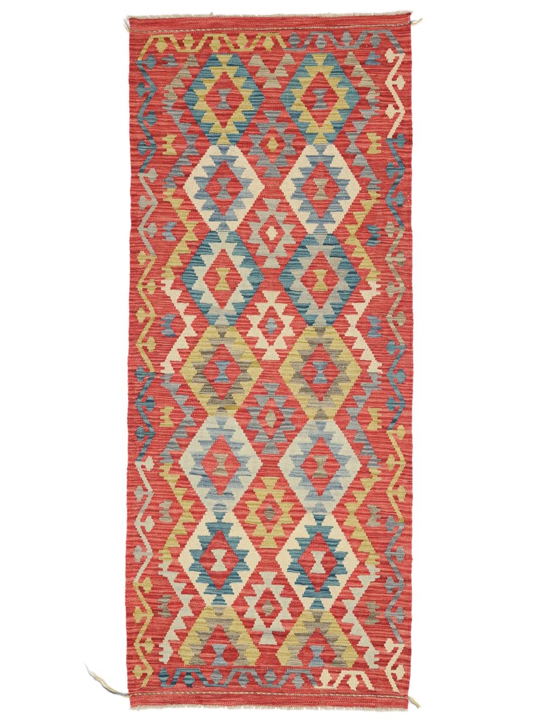 Hand-woven Afghan runner with a red, blue, and green geometric diamond pattern