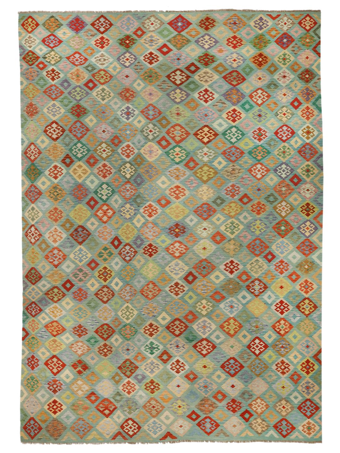 Duży, prostokątny, ręcznie tkany dywan typu afgański kilim z kolorowym geometrycznym wzorem w romby i medaliony.