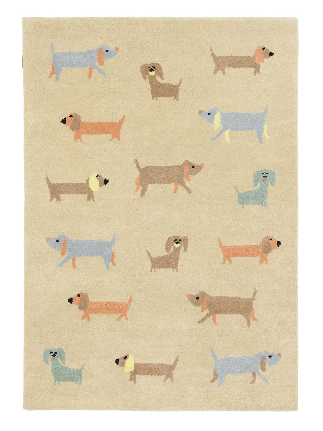 Handgetuft beige wollen vloerkleed met een speels pasteltinten hondenpatroon