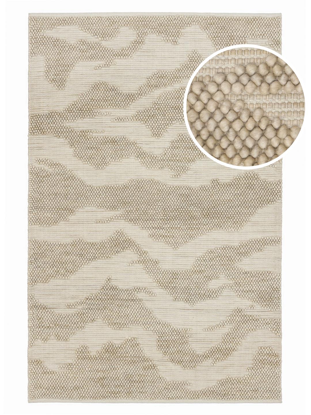 Handgeweven beige vloerkleed met een gestructureerd organisch patroon