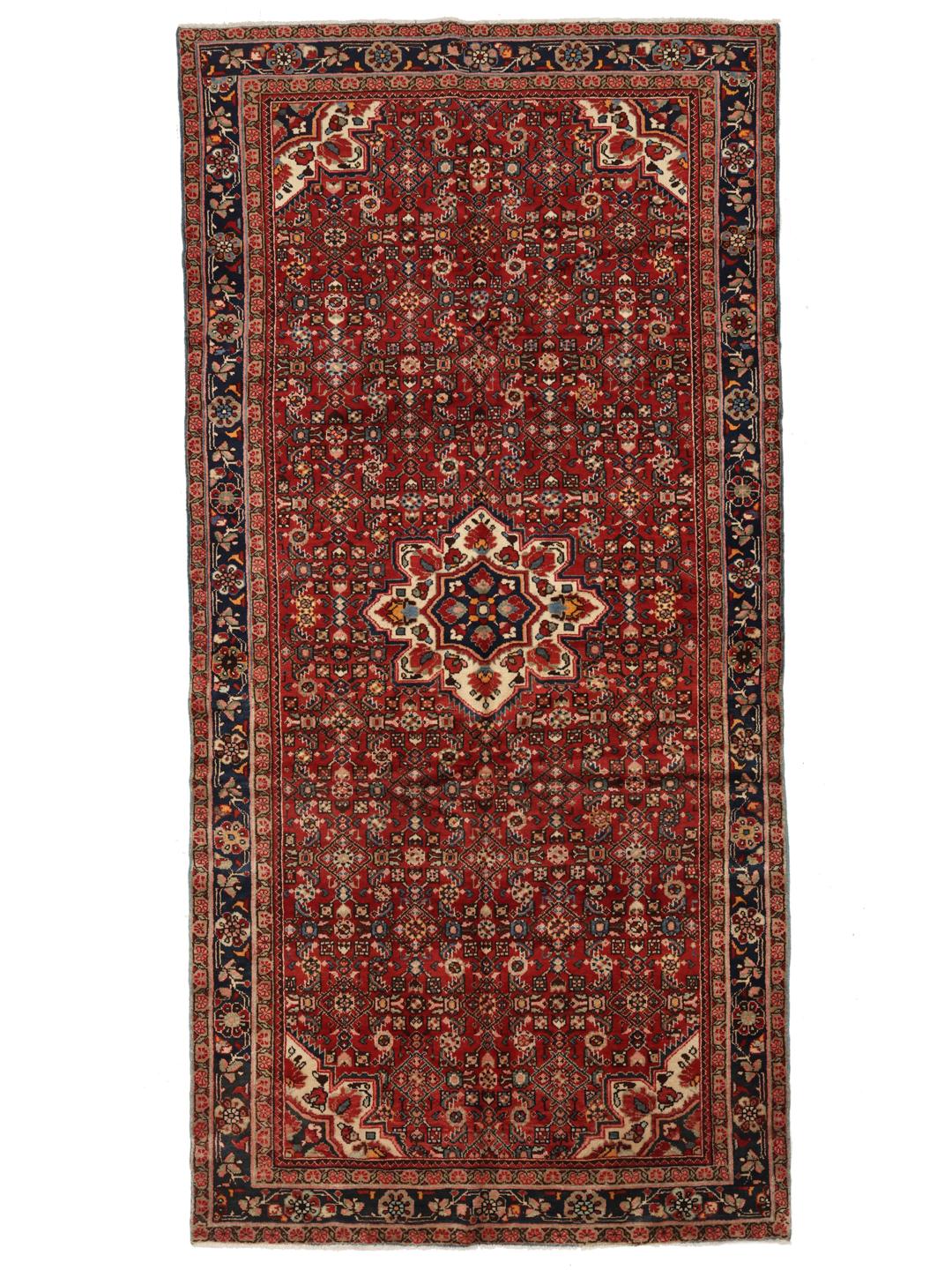 Hand-knotted Hosseinabad rug with a rich red field and decorative floral patterns