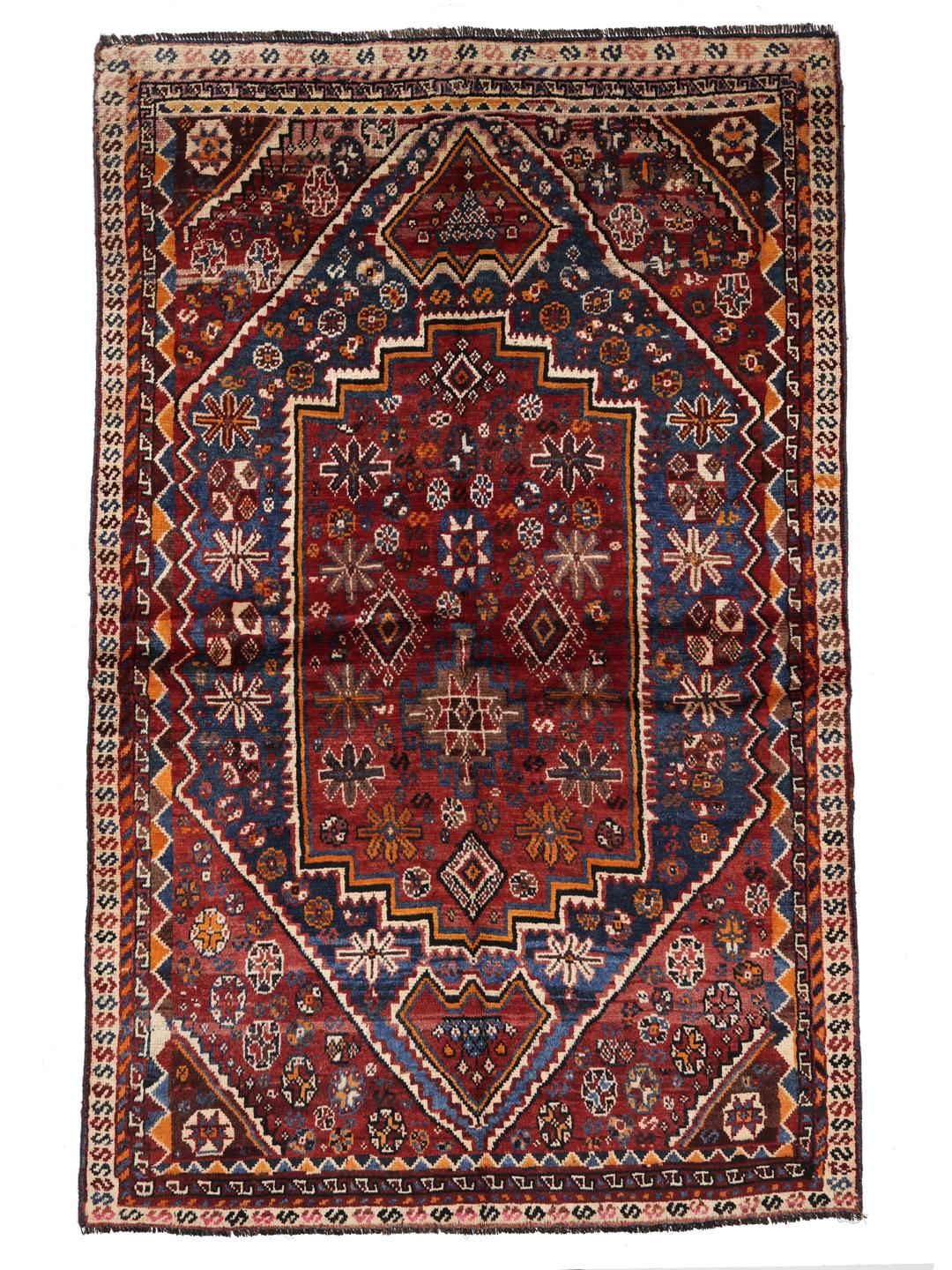 Hand-knotted Shiraz rug from the Middle East in red and blue tones