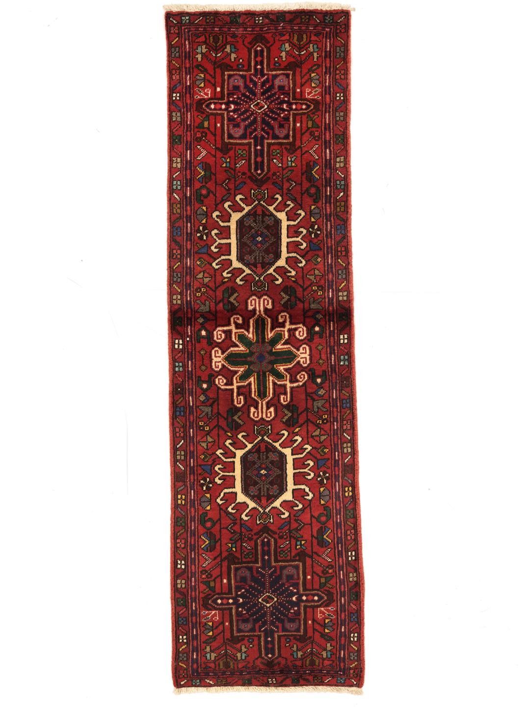 Hand-knotted Heriz runner from the Middle East in deep red tones