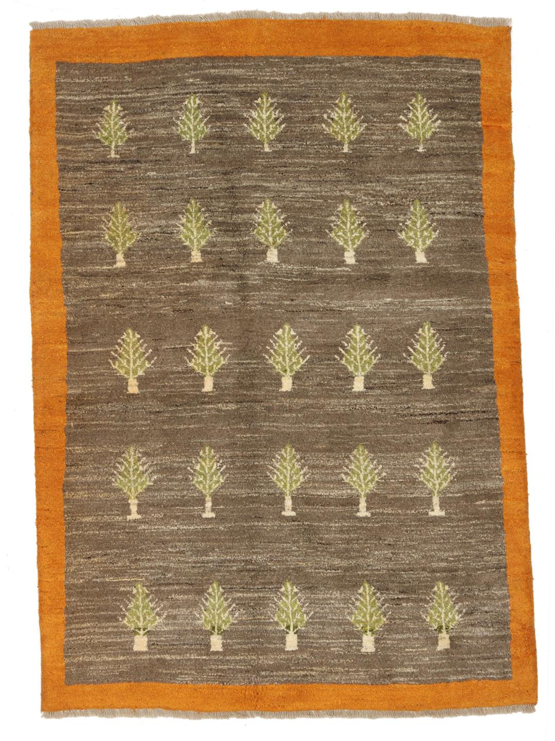 Håndknyttet Gabbeh-tæppe med træmønster i brun og grøn, med oprindelse i Mellemøsten.