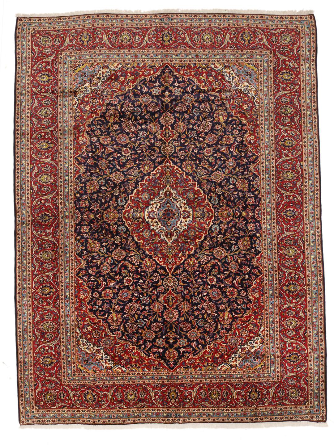 Hand-knotted Keshan rug from the Middle East in dark red and dark blue tones