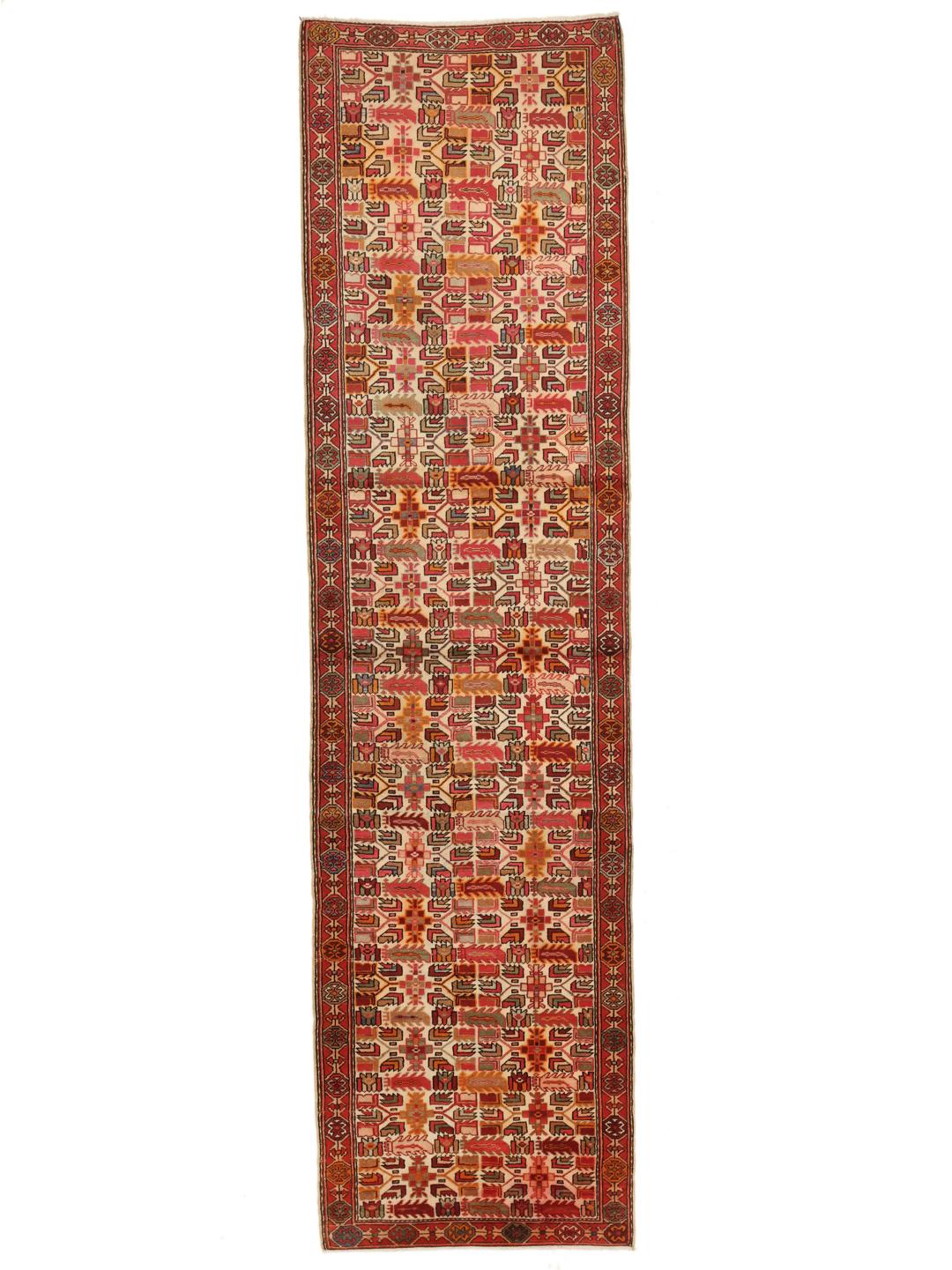 Handgeknoopte Ardebil-loper met geometrische motieven in veelkleurige wol uit het Midden-Oosten.