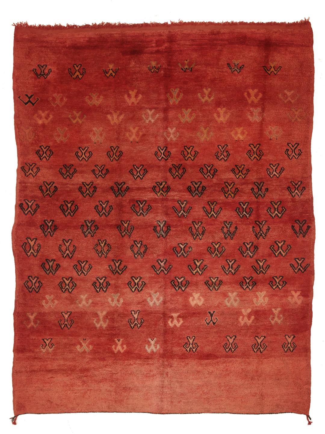 Vintage håndknyttet marokkansk tæppe med geometriske motiver på rød baggrund
