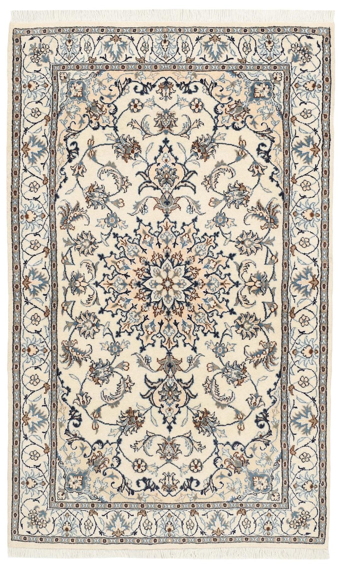 Handmade Nain rug from the Middle East with a beige field and blue floral motifs