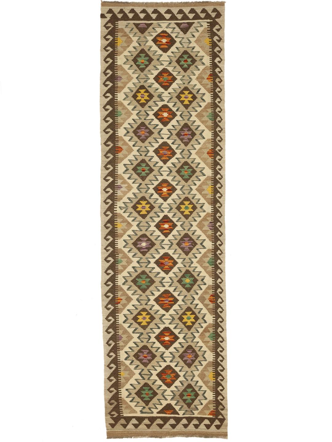 Hand-woven Afghan runner with geometric diamond patterns in beige and multicolor