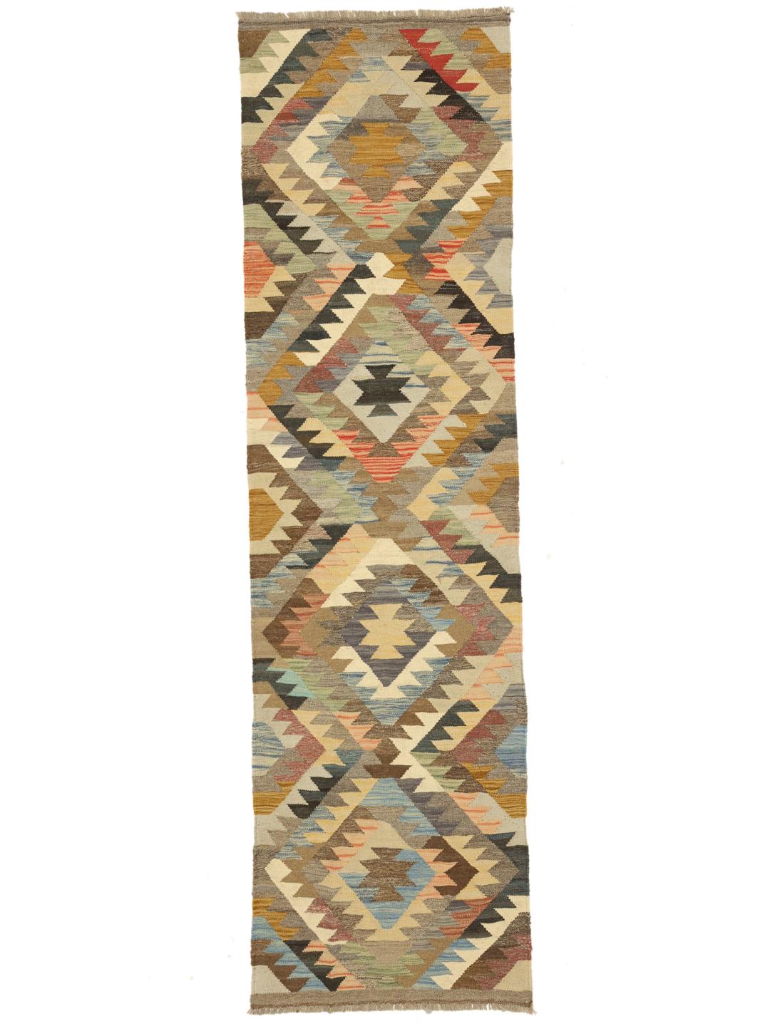 Hand-woven Afghan Kilim Ariana runner with geometric diamond patterns in multicolor wool.