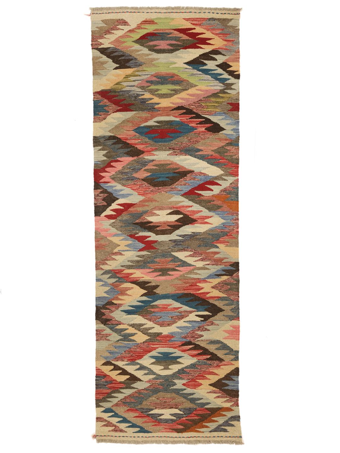 Hand-woven runner with a vibrant multicolored geometric pattern