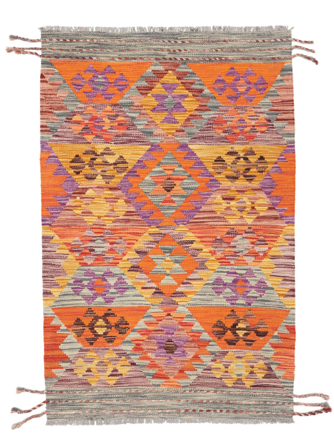Hand-woven Afghan Kelim rug featuring vibrant geometric patterns in multicolor wool.