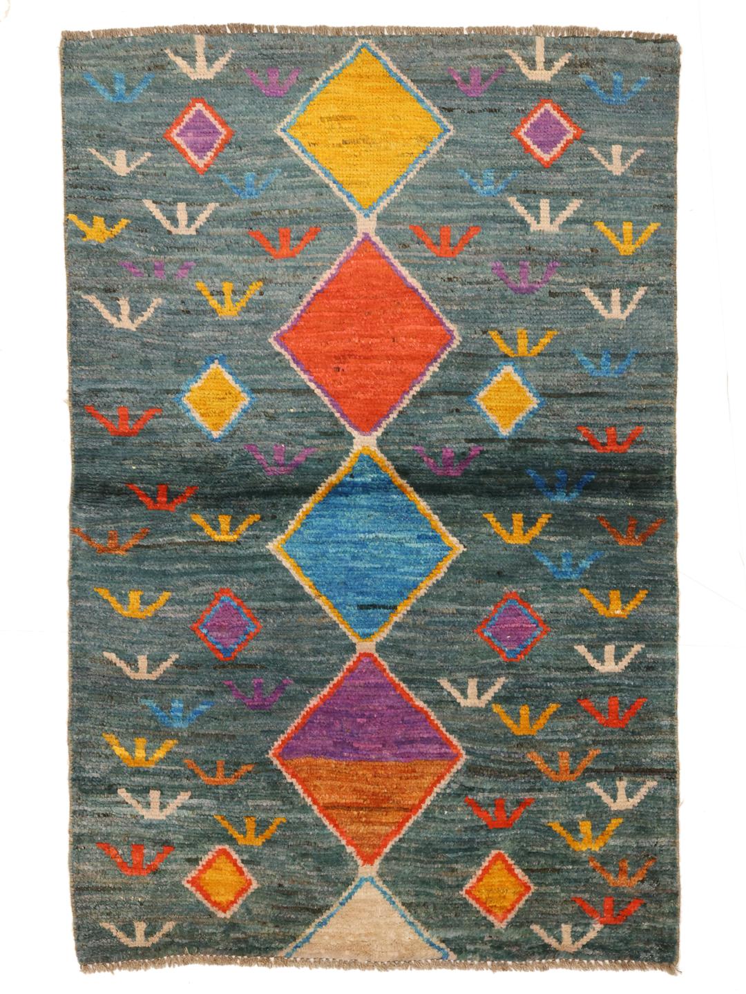 Handmade wool rug from Afghanistan in teal with colorful diamond patterns