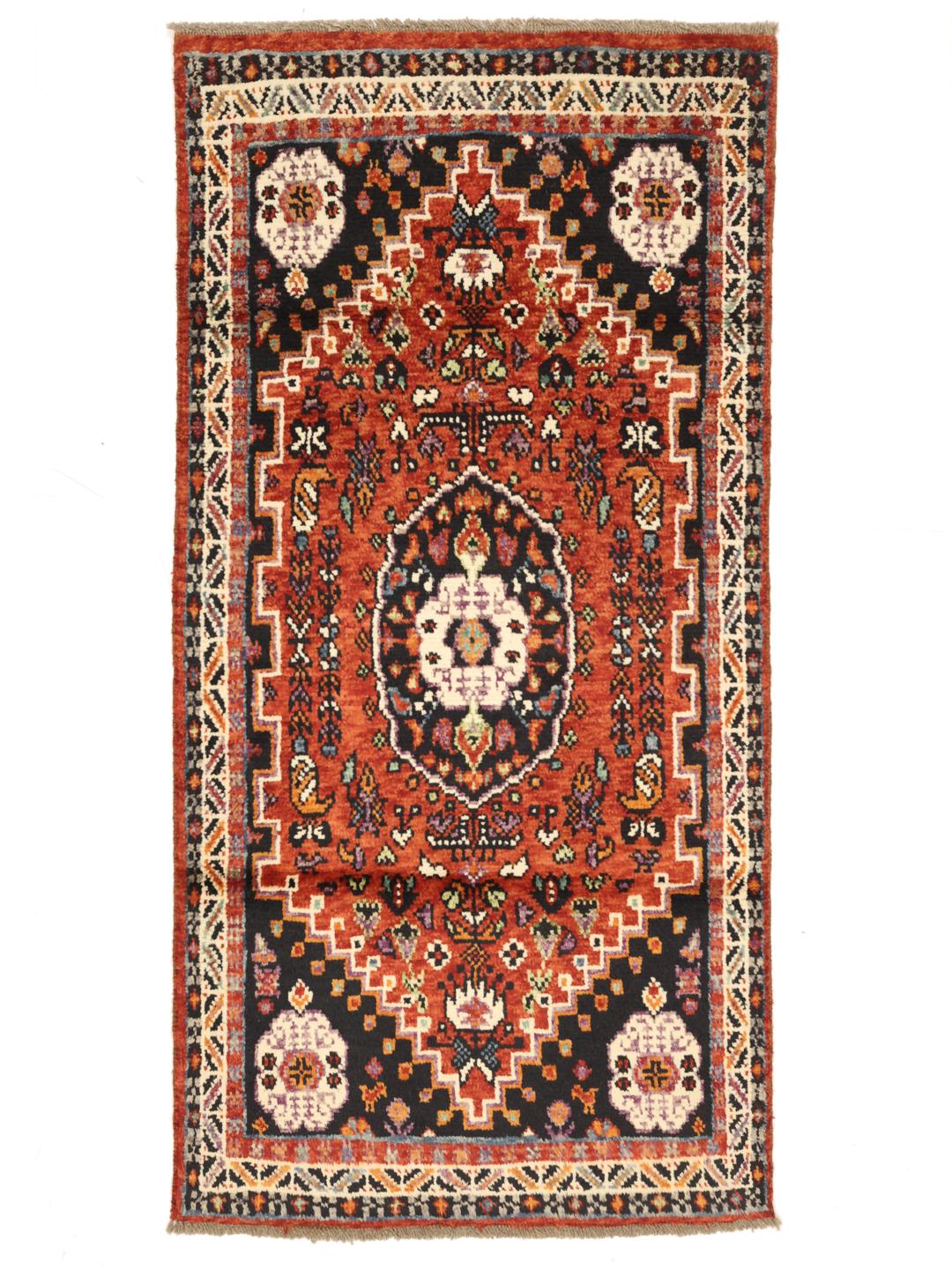 Hand-knotted Kazak rug from Afghanistan in red and black