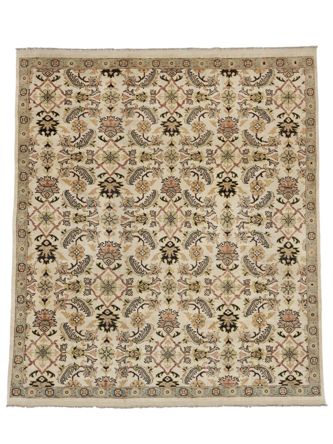 Handgeknoopt Afghaans Usak tapijt met bloemmotieven in beige en gedempte tinten