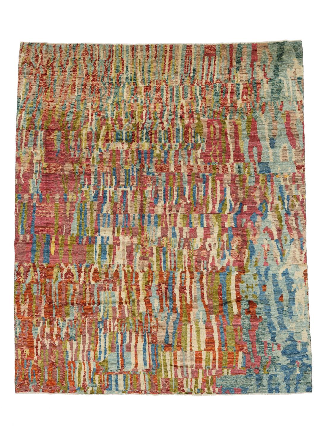 A large, hand-knotted Afghan rug featuring a vibrant, multicolored abstract pattern.