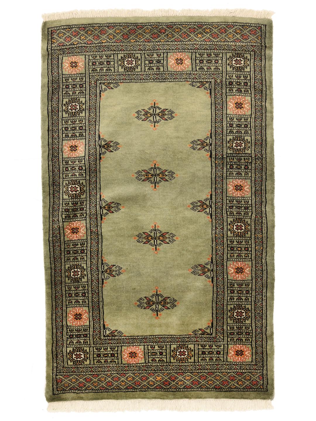 Handmade green Pakistan rug