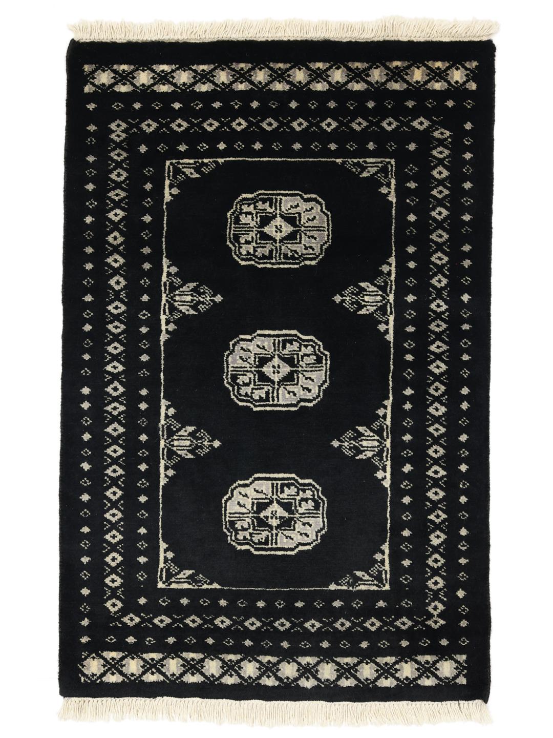 Hand-knotted Pakistan wool rug in black with traditional motifs