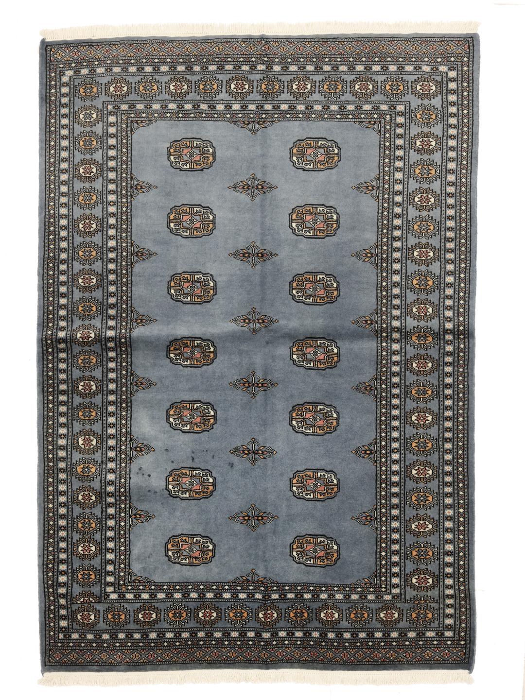 Hand-knotted Pakistan wool rug in blue with traditional patterns