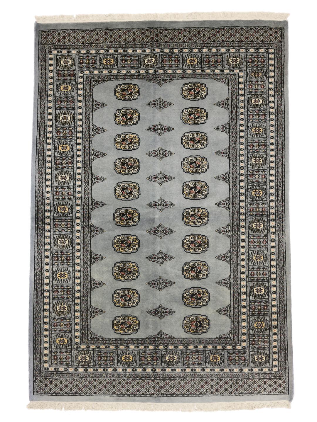 Hand-knotted Pakistani Bokhara rug in blue
