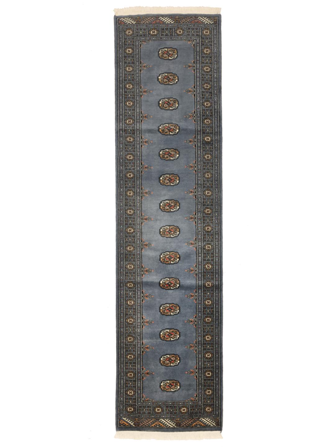 Handmade runner rug from Pakistan in blue with wool pile
