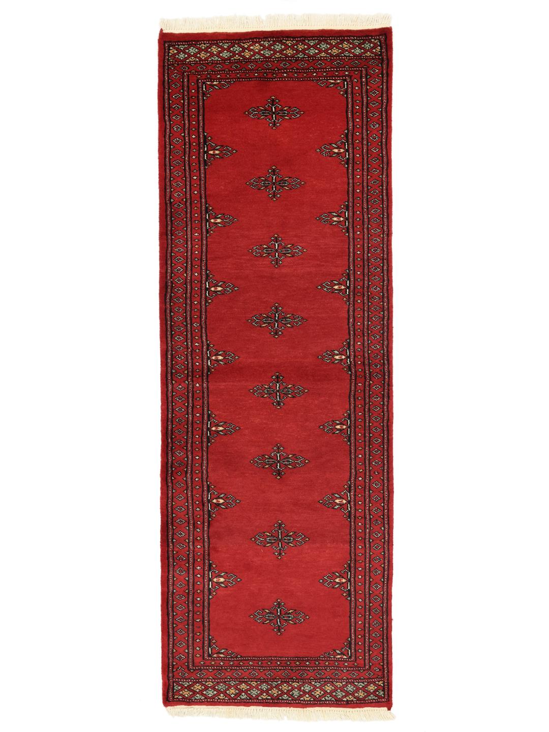 Red Pakistani wool runner rug with traditional motifs