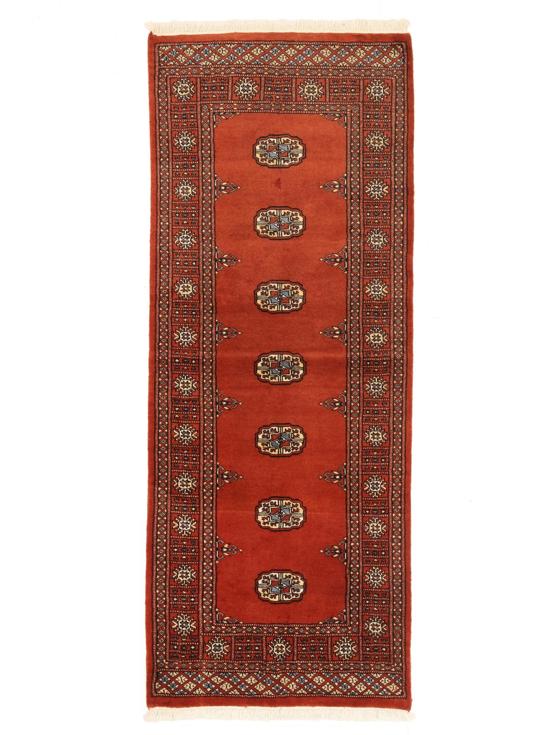 Red runner rug from Pakistan